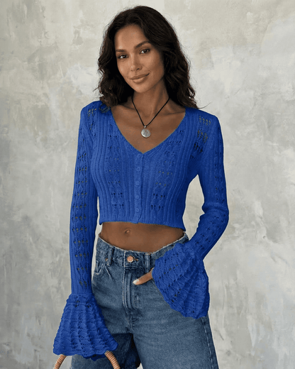 Royal Cardigan by Lauven, cropped cotton knit with flare sleeves, showcasing vibrant blue color and intricate hollow-out detailing.