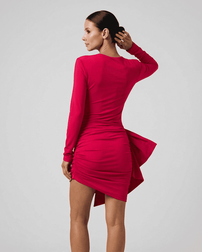 Ruby Mini Dress by Lauven showcasing a sleek fitted silhouette with ruched detailing in vibrant pink.