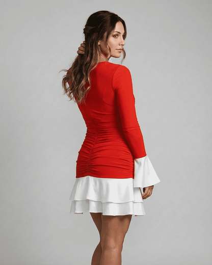 Ruby Mini Dress by Lauven - Back view showcasing vibrant red color, ruched design, and flared white sleeves.