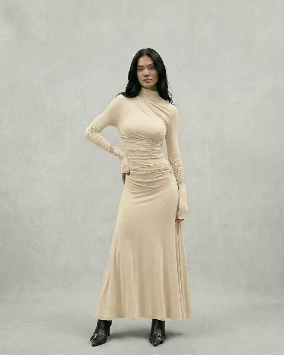 Sable Maxi Dress by Lauven, showcasing a sophisticated beige sheath silhouette with ruched detailing and long sleeves.