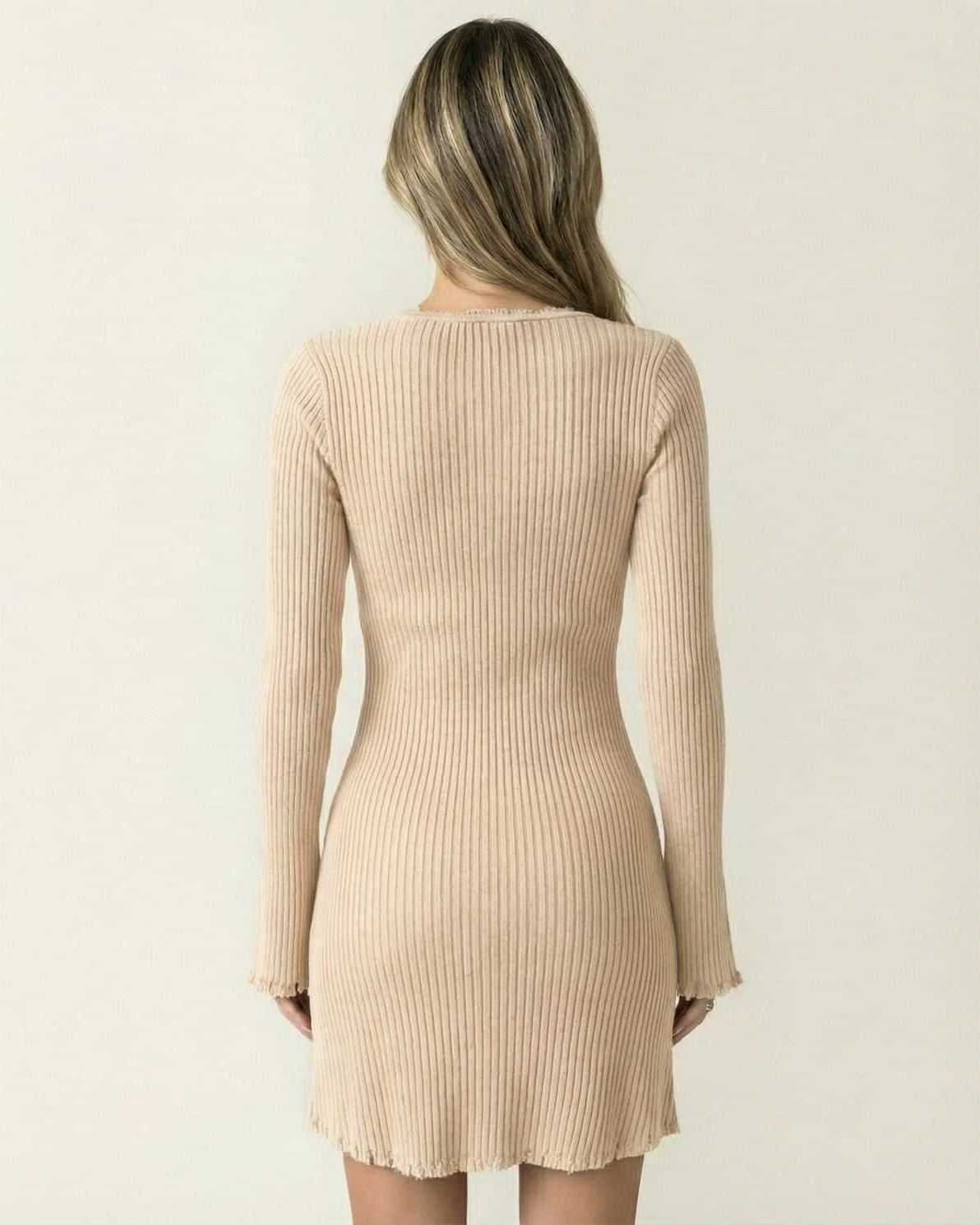 Sable Mini Dress by Lauven - Back view showcasing chic ribbed bodycon design with flare sleeves in warm beige.