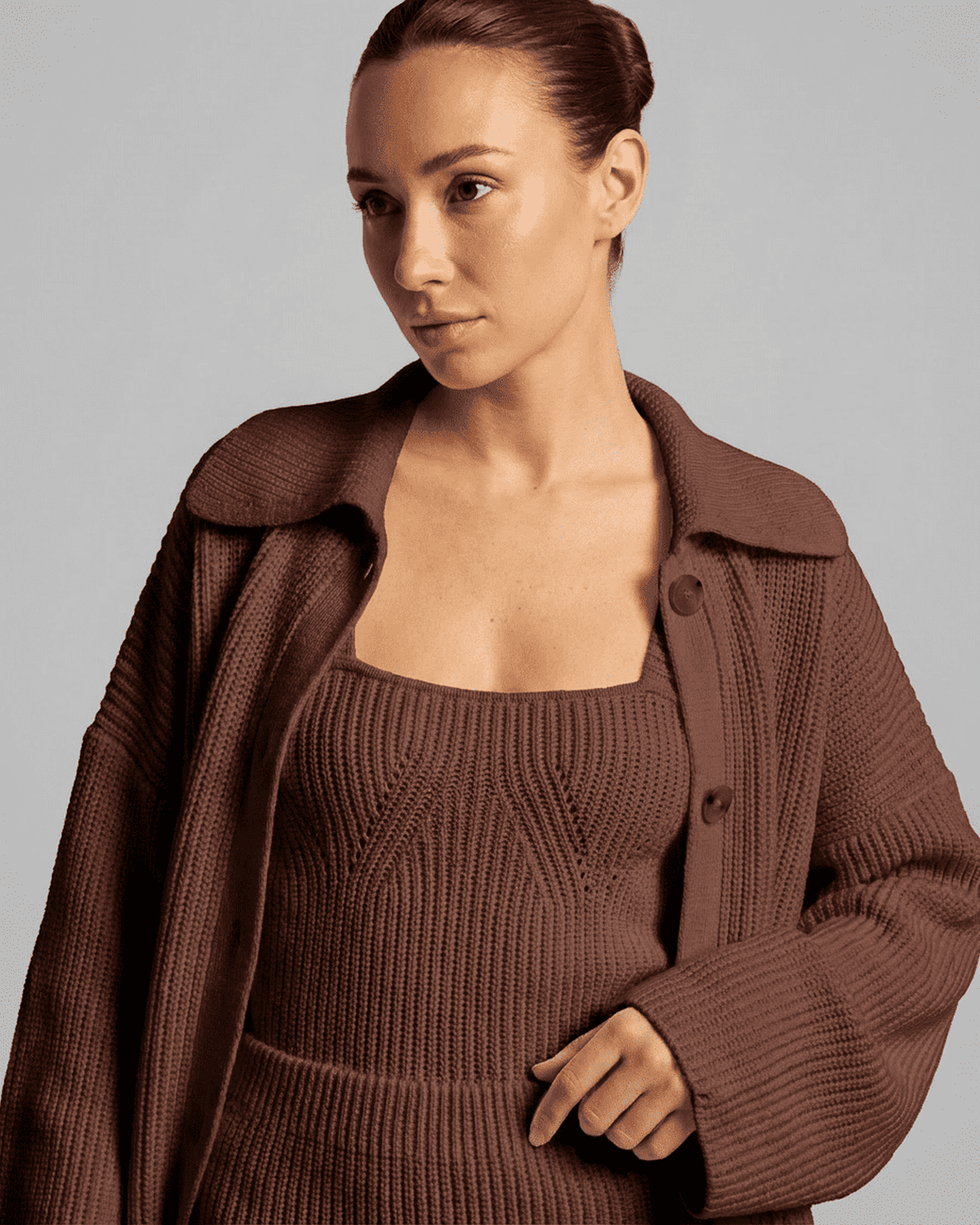 Model showcasing the Lauven Sable Mini Dress in rich brown knit. Elegant bodycon fit with a high-waist silhouette.