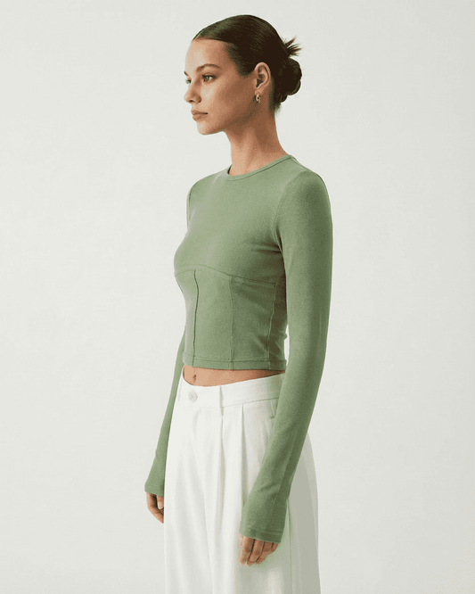 Sage Corset Top by Lauven, long sleeve jersey crop with structured corset design and soft green fabric.