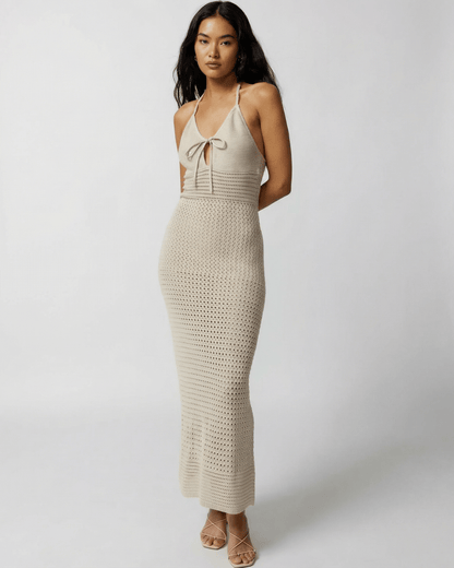 Sahara Maxi Dress by Lauven featuring crochet halter neck design and breathable neutral-toned fabric.