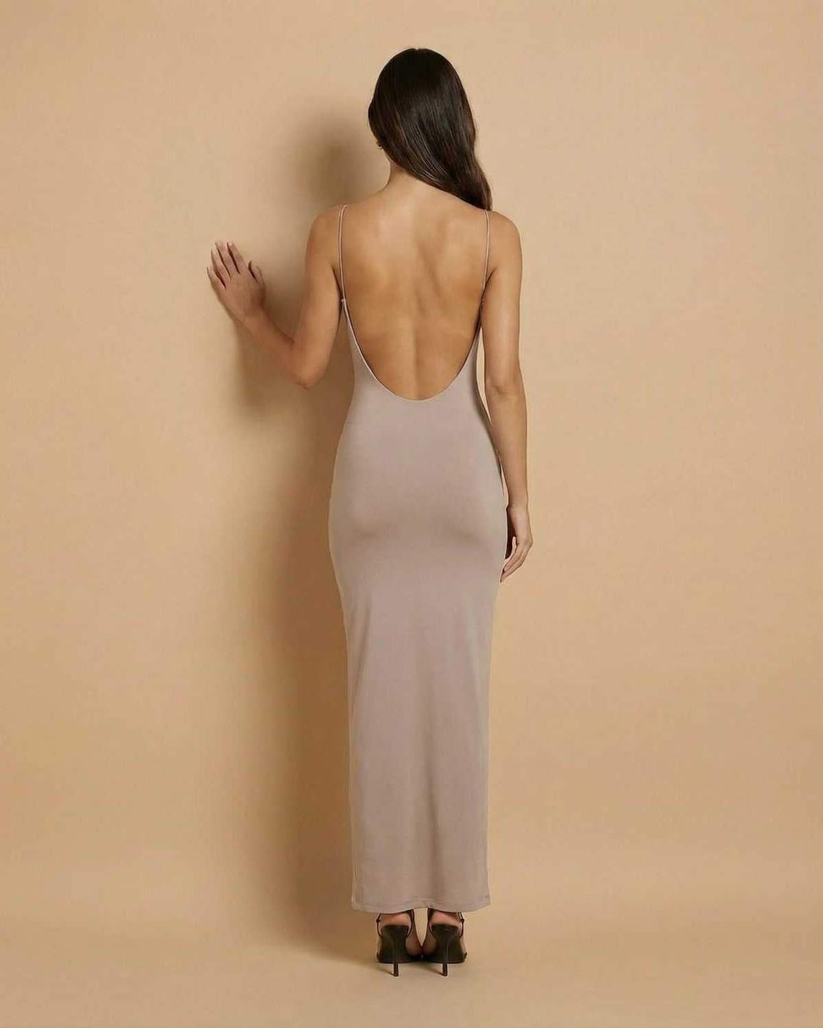 Sahara Maxi Dress by Lauven, taupe backless design showcasing modern elegance and a clean silhouette.