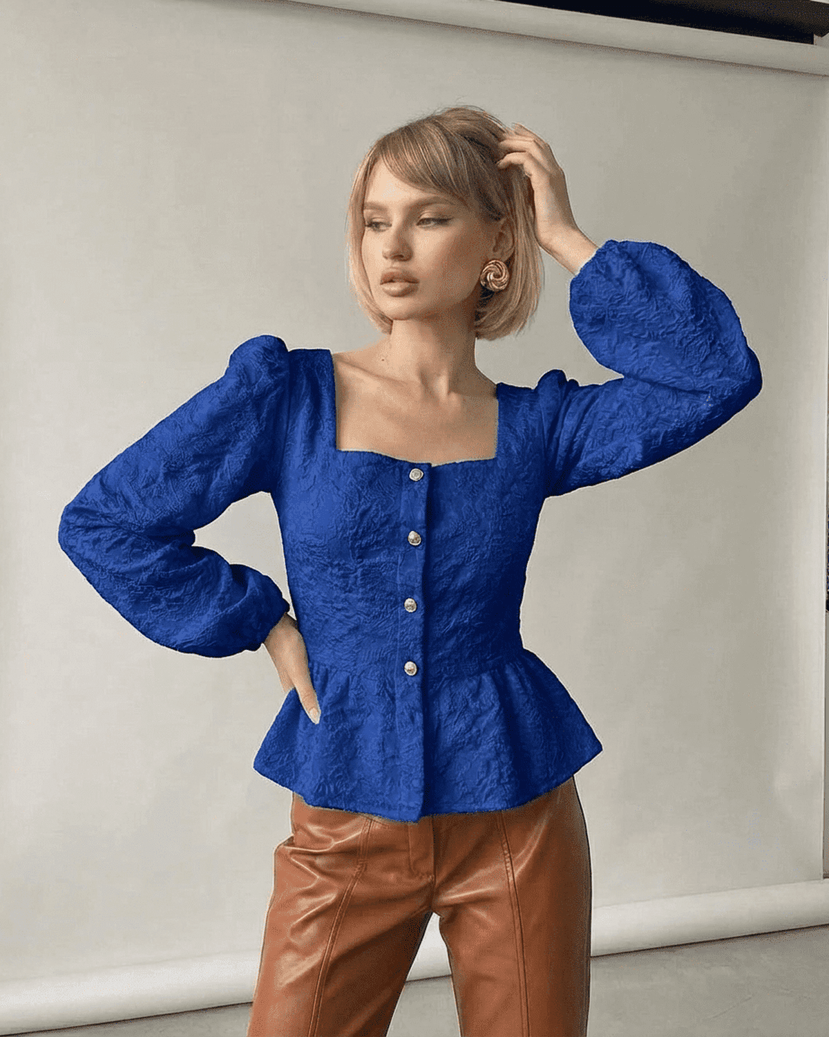 Sapphire Corset Top by Lauven featuring a jacquard square neck and puff sleeves in deep blue.