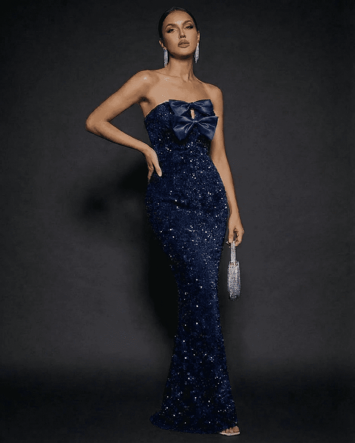 Lauven Sapphire Maxi Dress - Strapless sequin gown featuring a satin bow detail, perfect for formal occasions and parties.