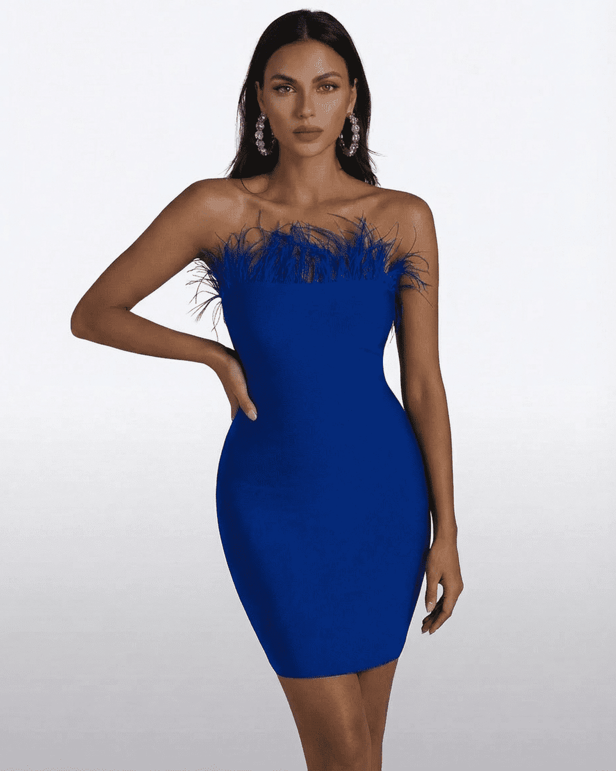 Sapphire Mini Dress by Lauven, a stunning strapless blue bodycon dress with feather trim.