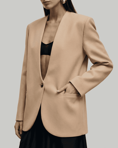 Savona Blazer by Lauven, fitted beige blazer with deep V-neckline and sleek design, perfect for versatile styling.