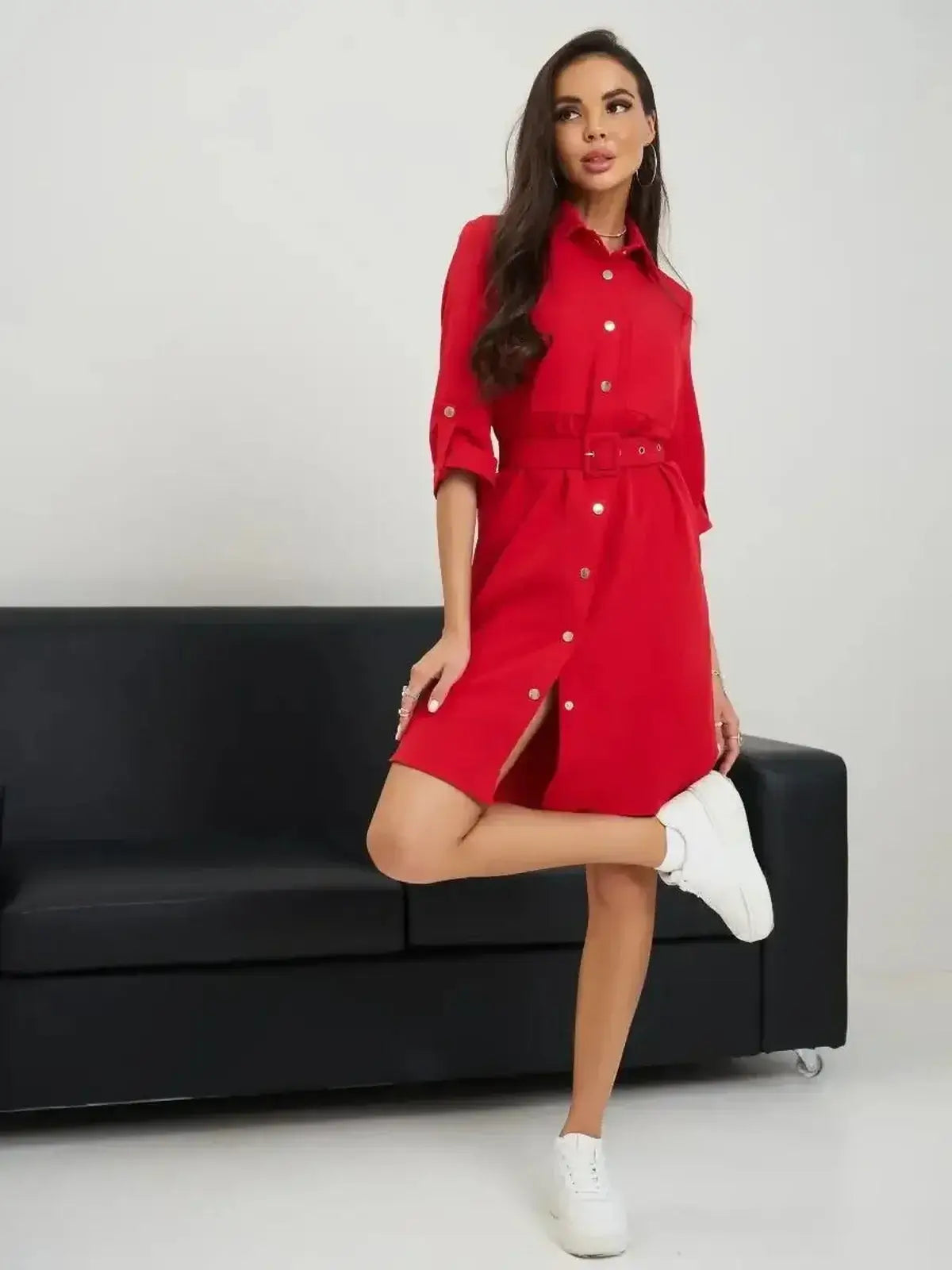 Model wearing the Scarlet Belted Mini dress by Lauven, showcasing its flattering fit and stylish design.