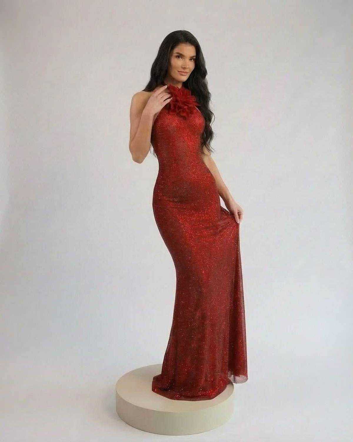 Scarlet Maxi Dress by Lauven featuring a halter neck and floral detail, showcasing a stunning red shimmer finish.