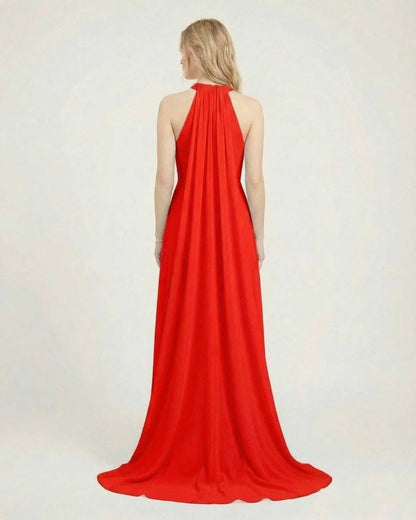 Back view of the Scarlet Maxi Dress by Lauven, featuring a red halter neck and flowing silhouette.