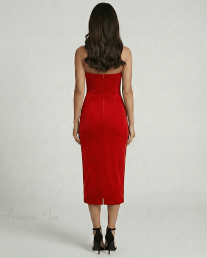 Back view of the Scarlet Midi Dress by Lauven, showcasing its sleek strapless silhouette and bold red color.