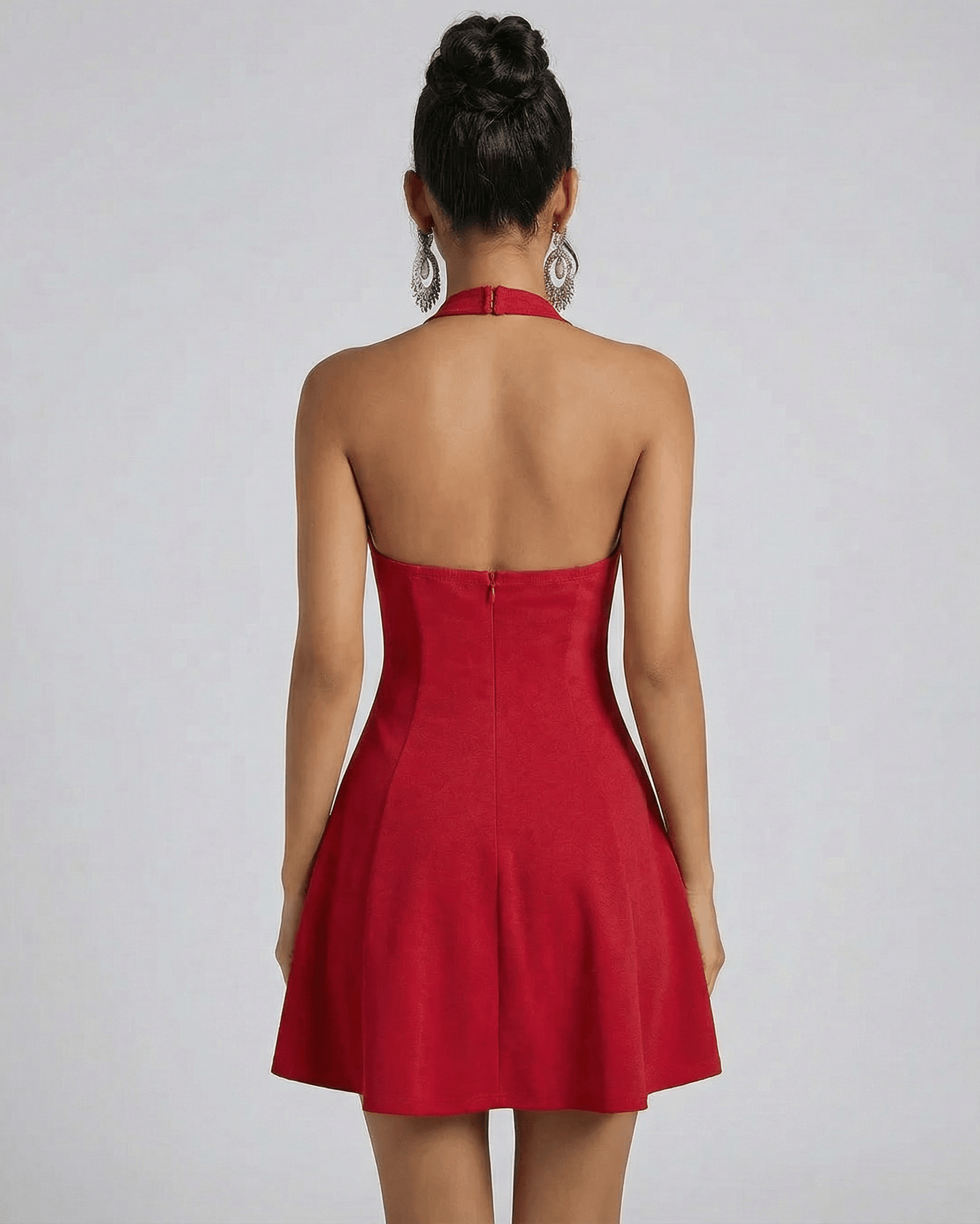 Scarlet Mini Dress by Lauven showcasing a flared red silhouette from the back.