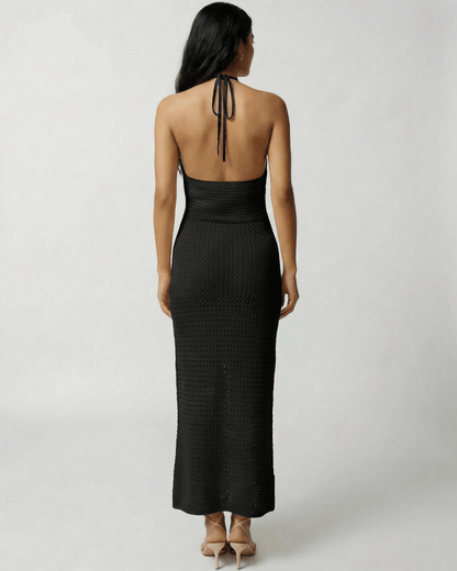 Selene Maxi Dress by Lauven, showcasing an open-back crochet halter silhouette in black.