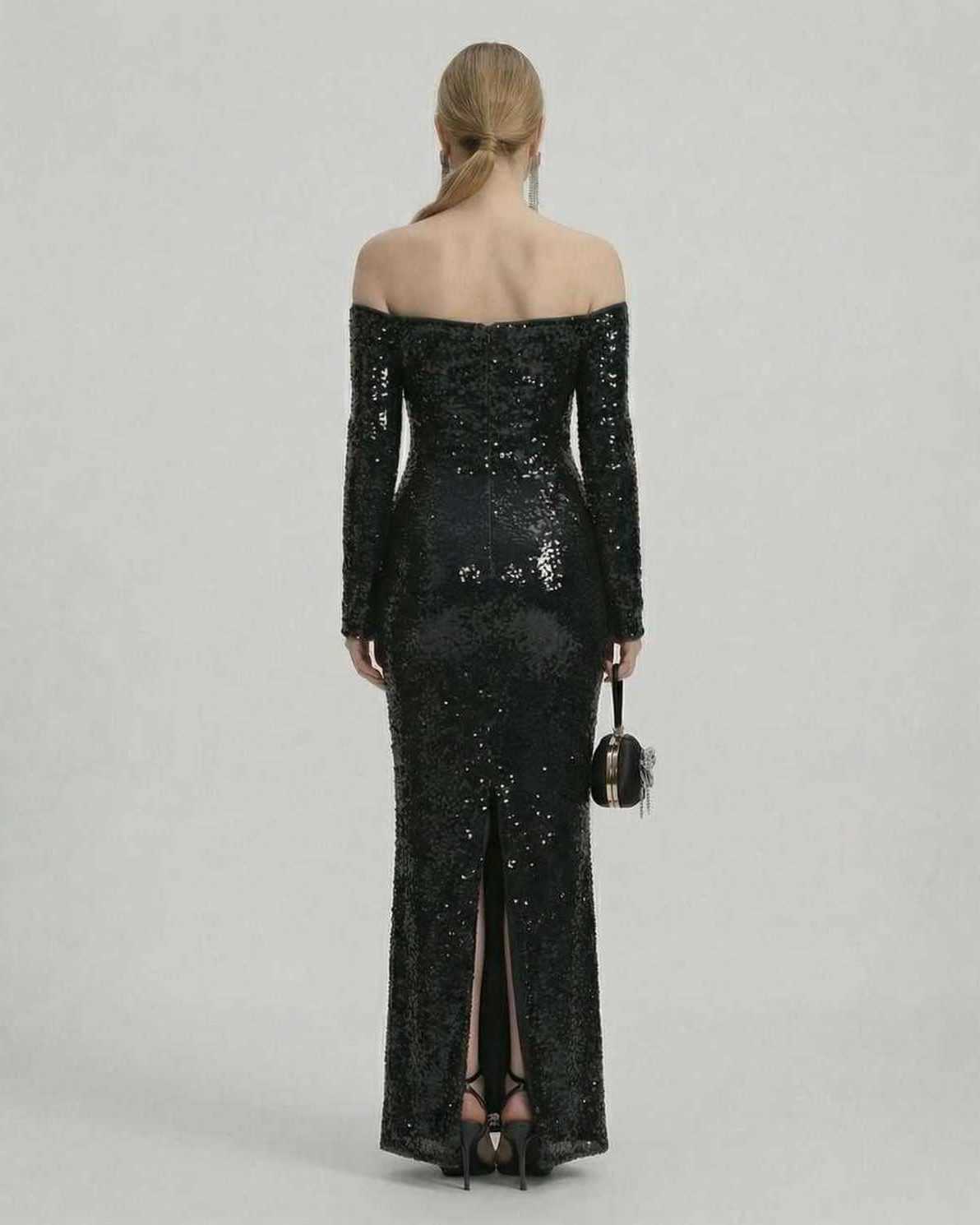 Back view of the Selene Maxi Dress by Lauven, featuring black sequins and an off-shoulder design.