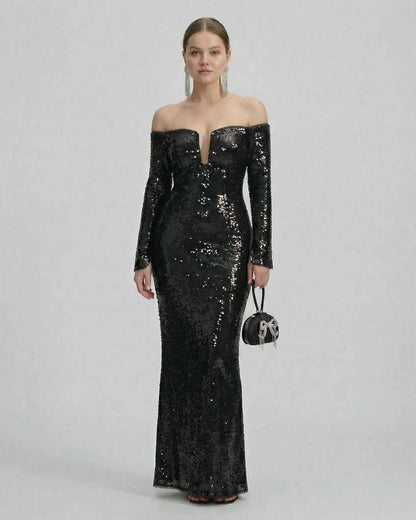 Selene Maxi Dress by Lauven, a black sequined off-shoulder evening gown with a dramatic plunge neckline.