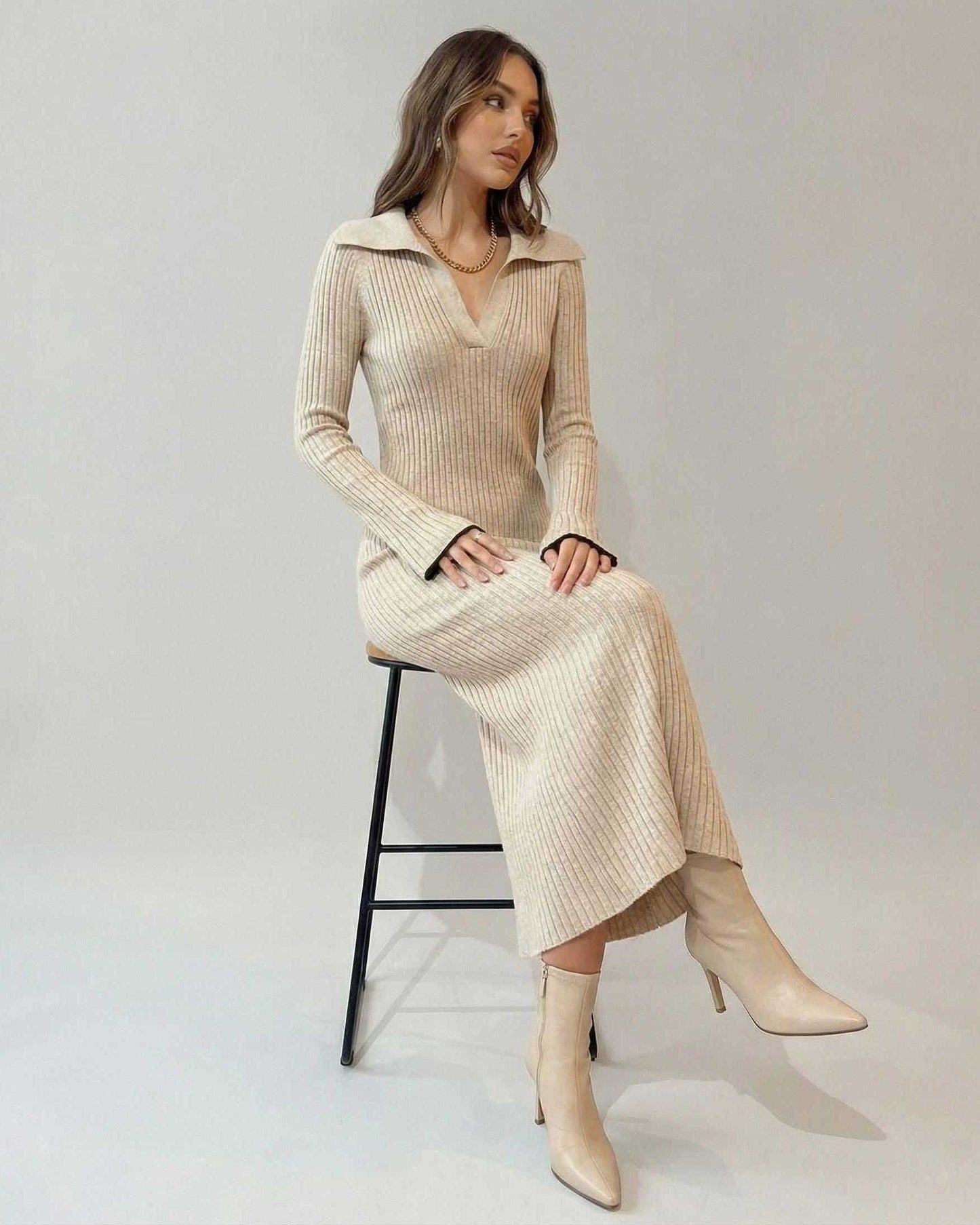 Selene Midi Dress by Lauven, a ribbed knit V-neck dress styled with ankle-length elegance.