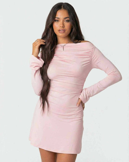 Selene Mini Dress in soft pink from Lauven, featuring asymmetrical neckline and slim pencil silhouette.