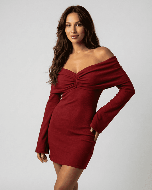 Selene Mini Red dress by Lauven featuring an off-shoulder neckline with ruffle detailing in a flattering slim fit.