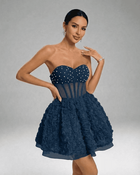 Selene Mini Dress by Lauven featuring a strapless navy floral pouf design with beaded corset and sheer mesh details.