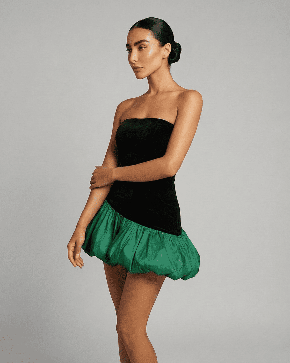 Selina Green Dress by Lauven, featuring an elegant strapless design with a puffed green skirt.