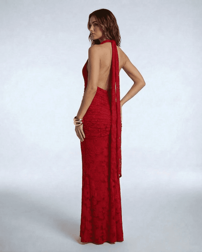 Seraphina Maxi Dress by Lauven - Back view of the red jacquard mermaid gown with ribbon tie and deep V-neckline.
