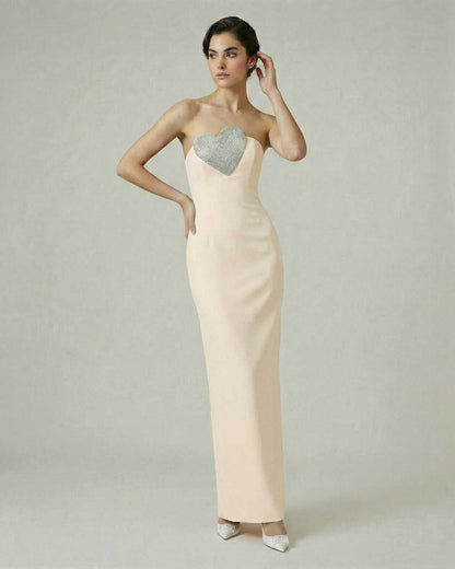 Seraphine Maxi Dress by Lauven, strapless champagne design with embellished heart bodice and sleek floor-length silhouette.