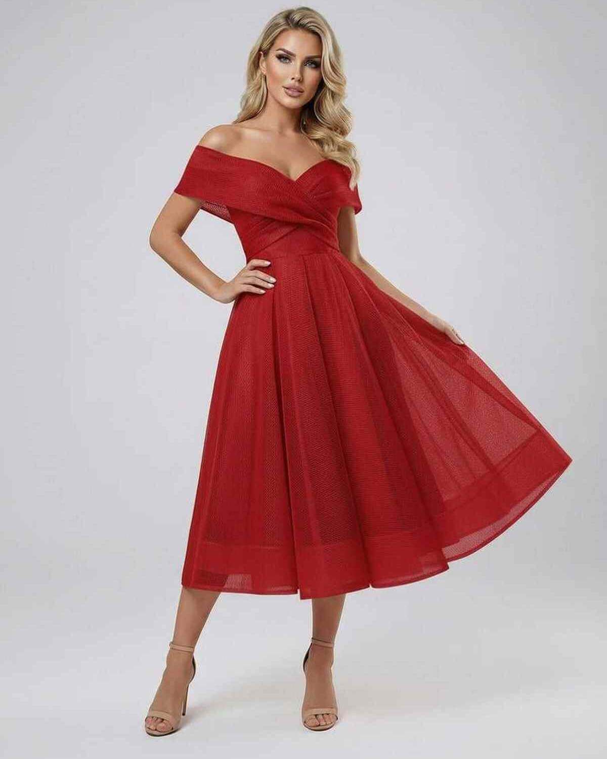 Model wearing the Lauven Seren Midi Dress, an elegant off shoulder red dress with a flowing skirt.