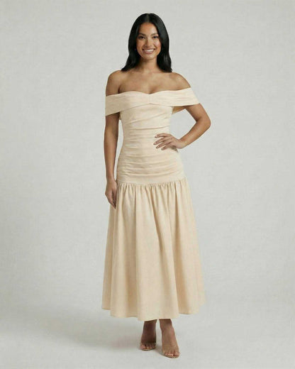 Seren Midi Dress by Lauven - Soft beige off-shoulder elegance with flattering slash neckline and sculpted silhouette.