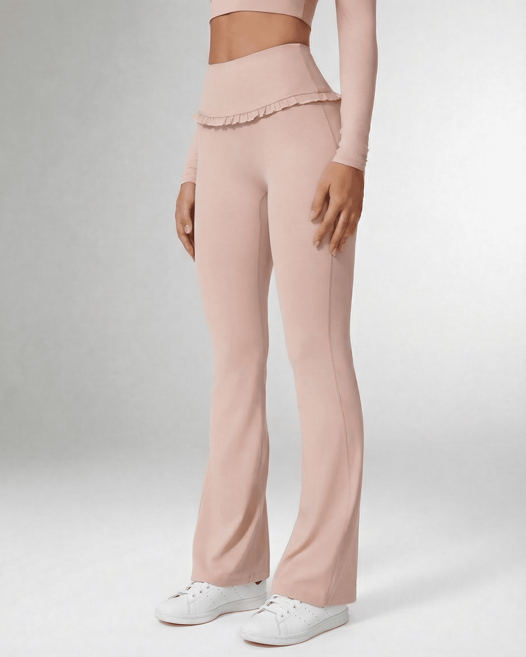 Serena Leggings by Lauven in soft pink, featuring a high-waisted ruffled design for elegant flair.