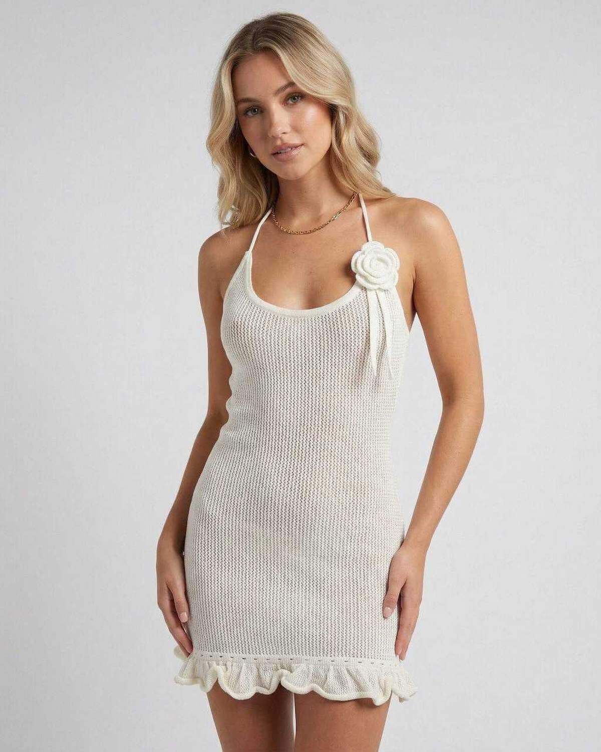 Serena Mini Dress by Lauven - Cream halter neck dress with pleated texture and ruffle hem.
