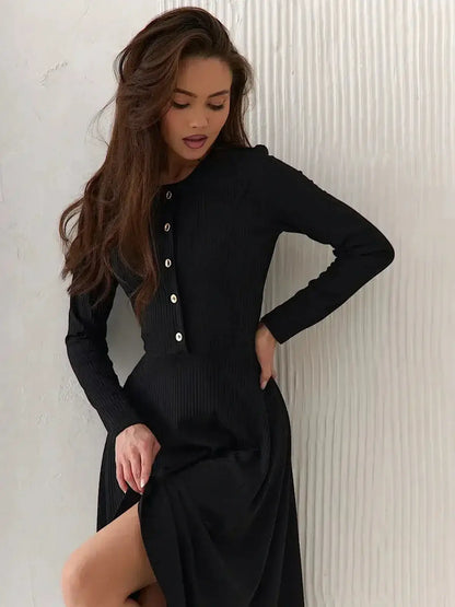 Serene Grace Midi Dress by Lauven featuring a black ribbed silhouette and decorative buttons.