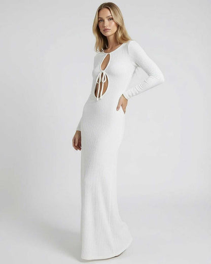 Serene Maxi Dress by Lauven - Elegant white maxi with hollow-out details and long sleeves.