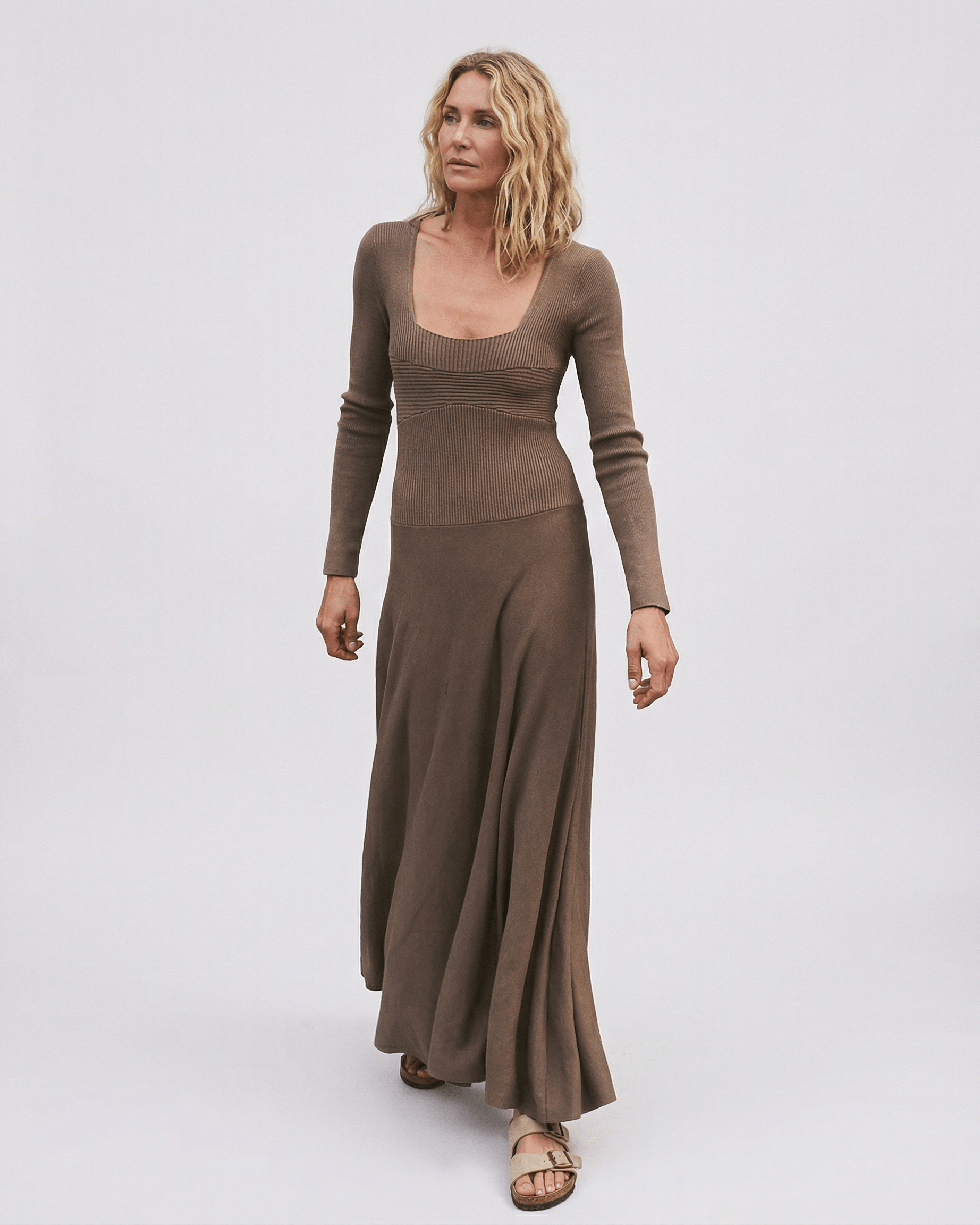 Lauven Siena Maxi Dress in rich brown tone with long sleeves and pleated skirt, showcasing a square neckline.