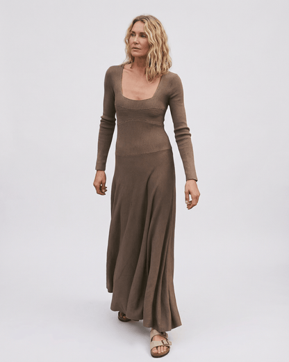 Lauven Siena Maxi Dress in rich brown tone with long sleeves and pleated skirt, showcasing a square neckline.