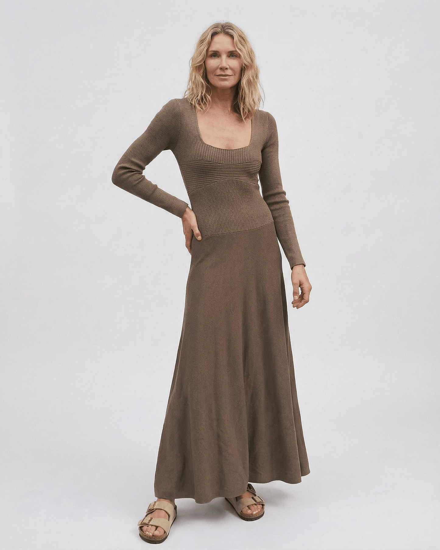 Siena Maxi Dress by Lauven in rich brown with long sleeves, square neck, and elegant pleated skirt.