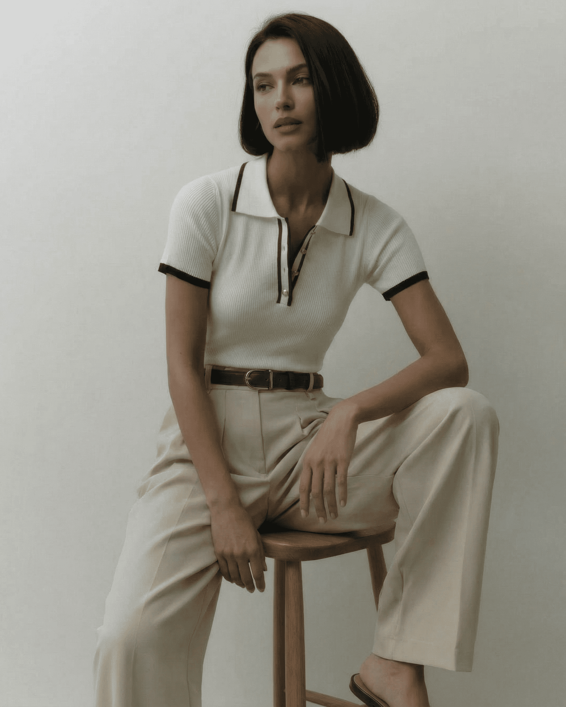 Siena Polo Shirt by Lauven, showcased by a model in a polished, refined style with modern contrast details.