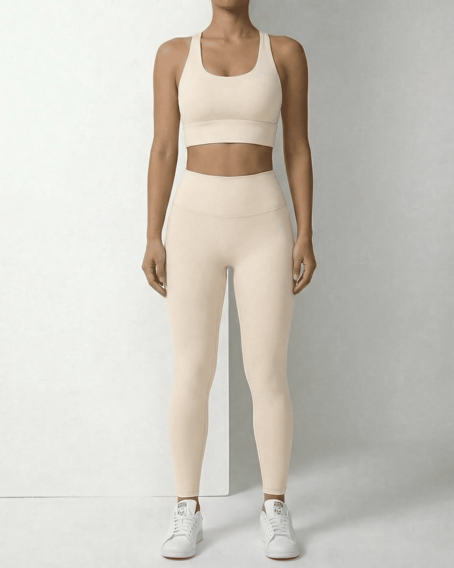 Sienna Leggings from Lauven in beige with a matching crop top, highlighting a high waist and ankle length design.