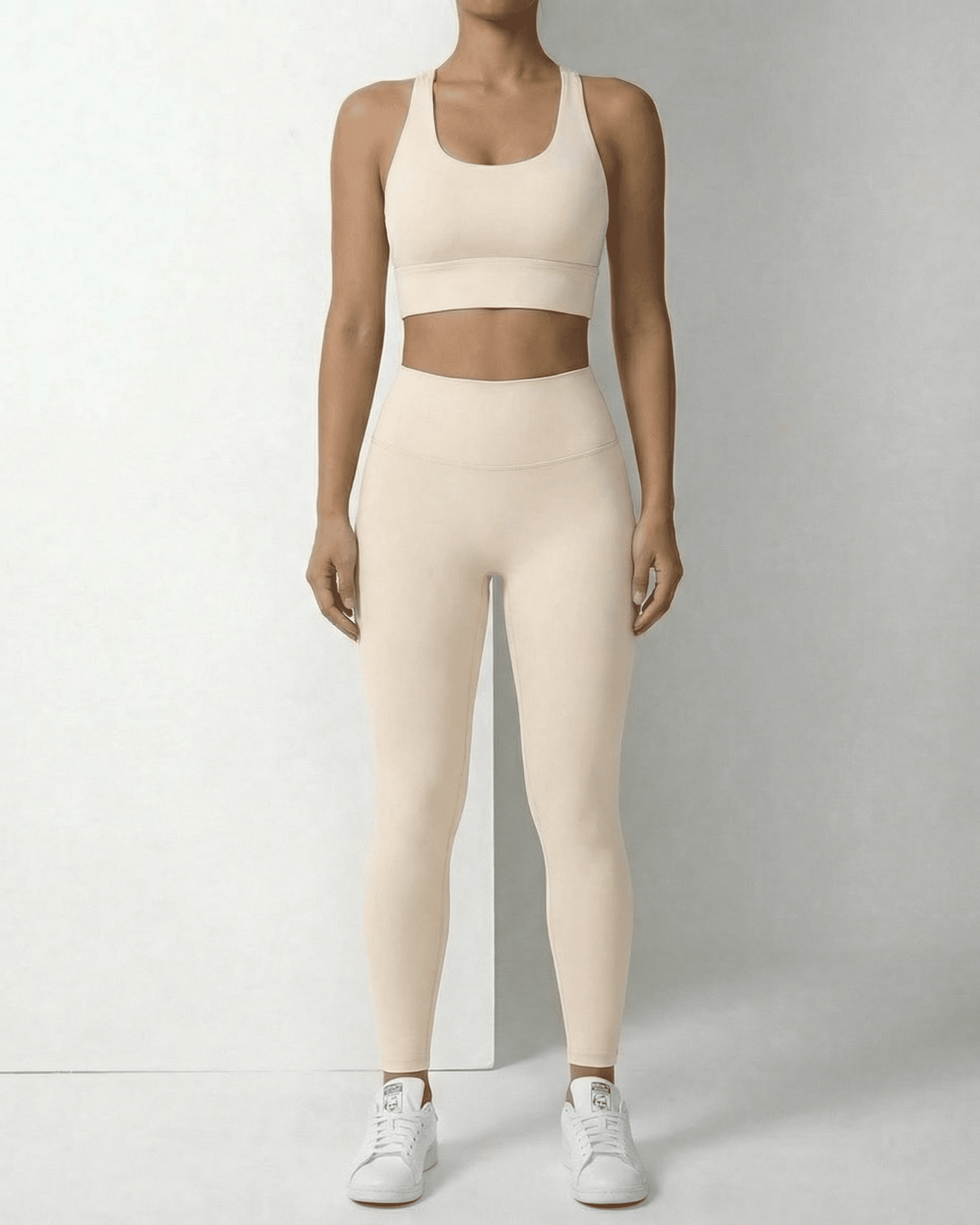 Sienna Leggings from Lauven in beige with a matching crop top, highlighting a high waist and ankle length design.