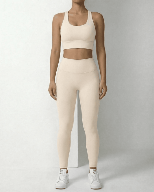 Sienna Leggings from Lauven in beige with a matching crop top, highlighting a high waist and ankle length design.