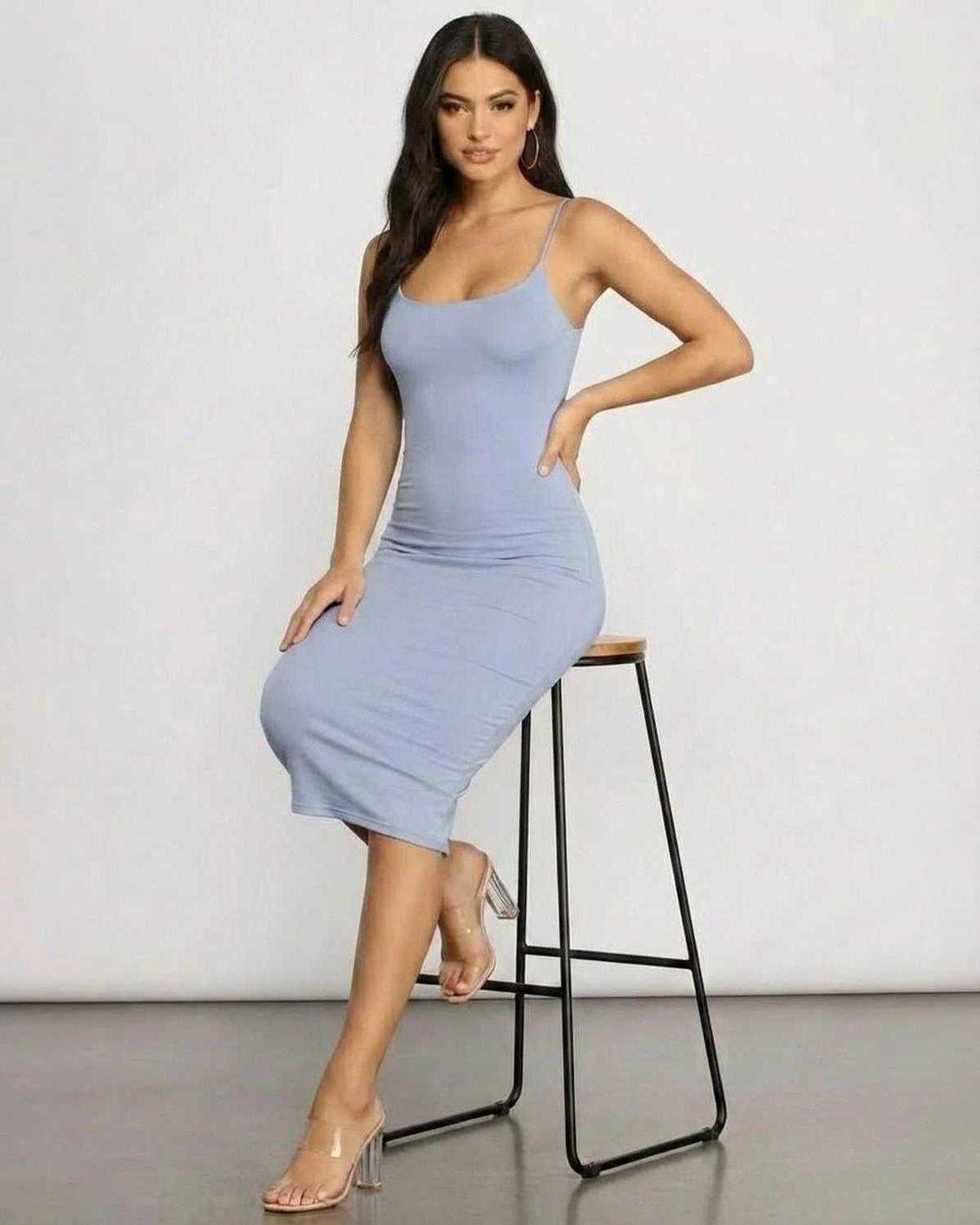 Sienna Midi Dress by Lauven featuring a sleek knit silhouette in light blue, perfect for elegant occasions.