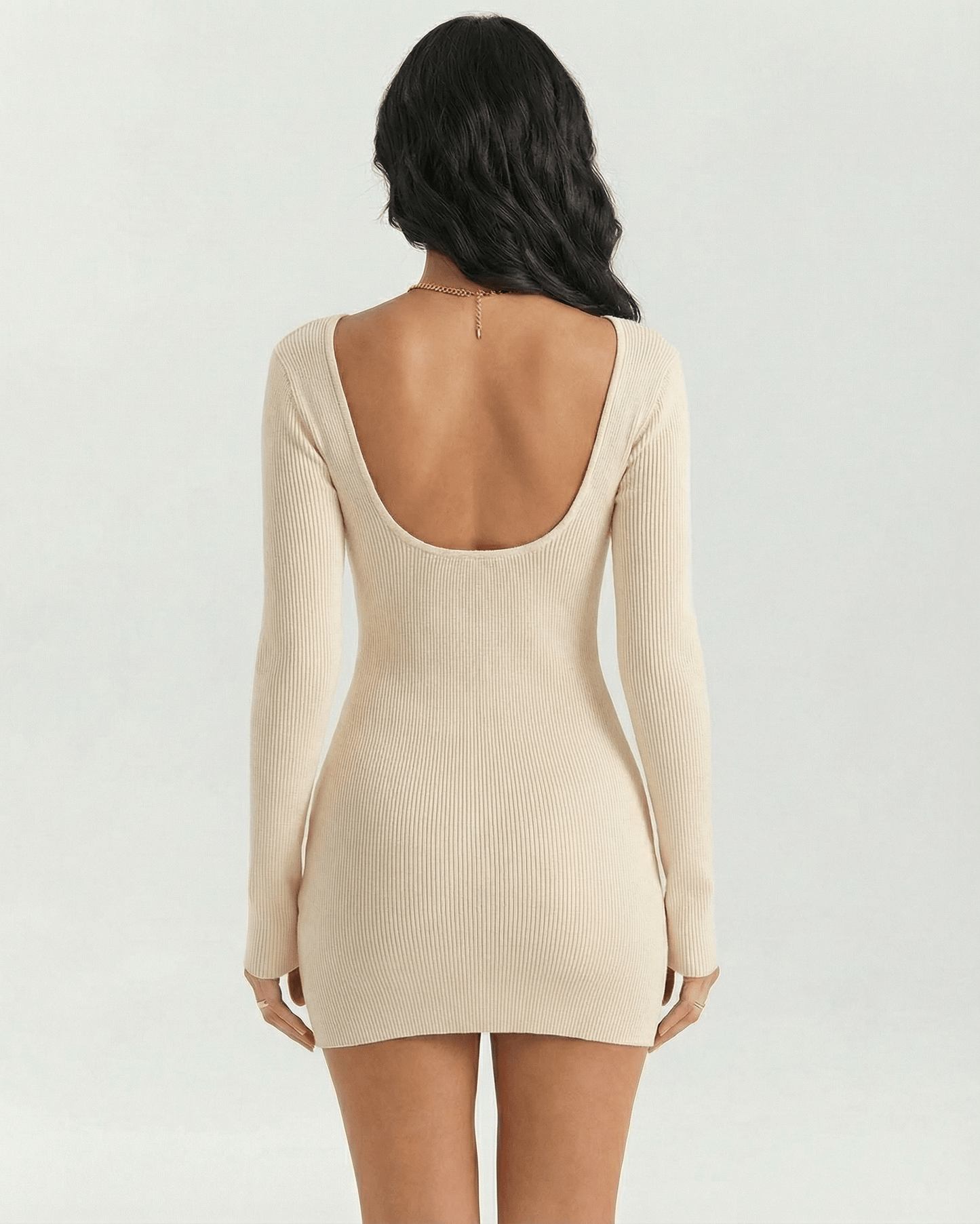 Back view of the Sienna Mini Dress by Lauven, featuring a ribbed fabric, long sleeves, and a square neckline.