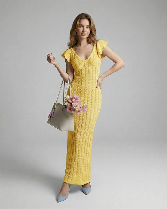 Model wearing Solara Maxi Dress by Lauven, a vibrant yellow lace maxi dress with V-neck and ruffle sleeves.