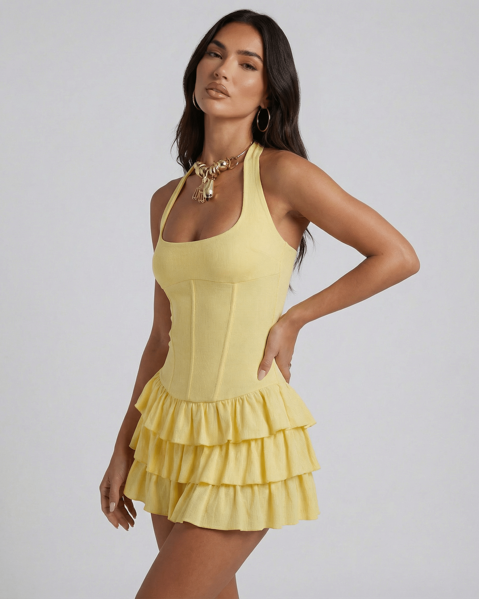 Lauven Solara Mini Dress featuring a square neckline and tiered skirt in vibrant yellow for summer chic.