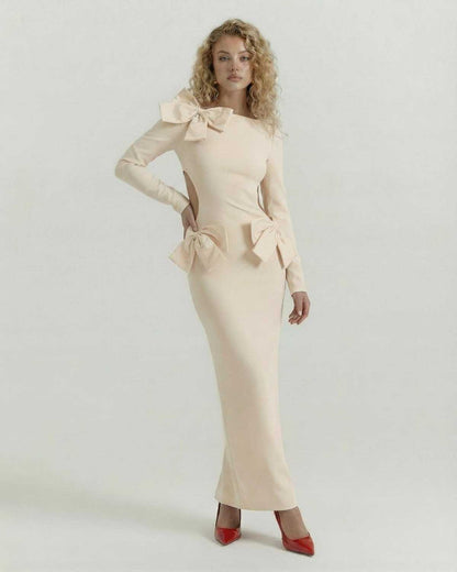 Soleil Maxi Dress by Lauven - Elegant cream sheath dress with open back and bow accents.