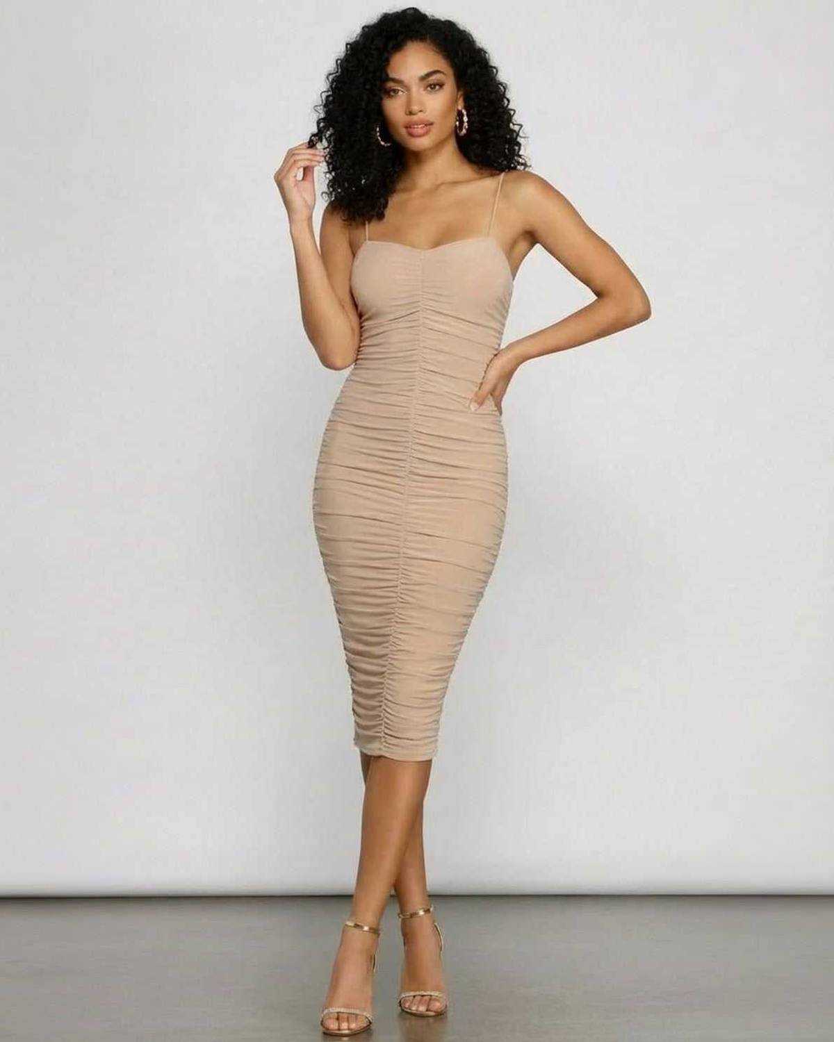 Solenne Midi Dress by Lauven featuring a sweetheart neckline and ruched bodycon silhouette, perfect for evening wear.