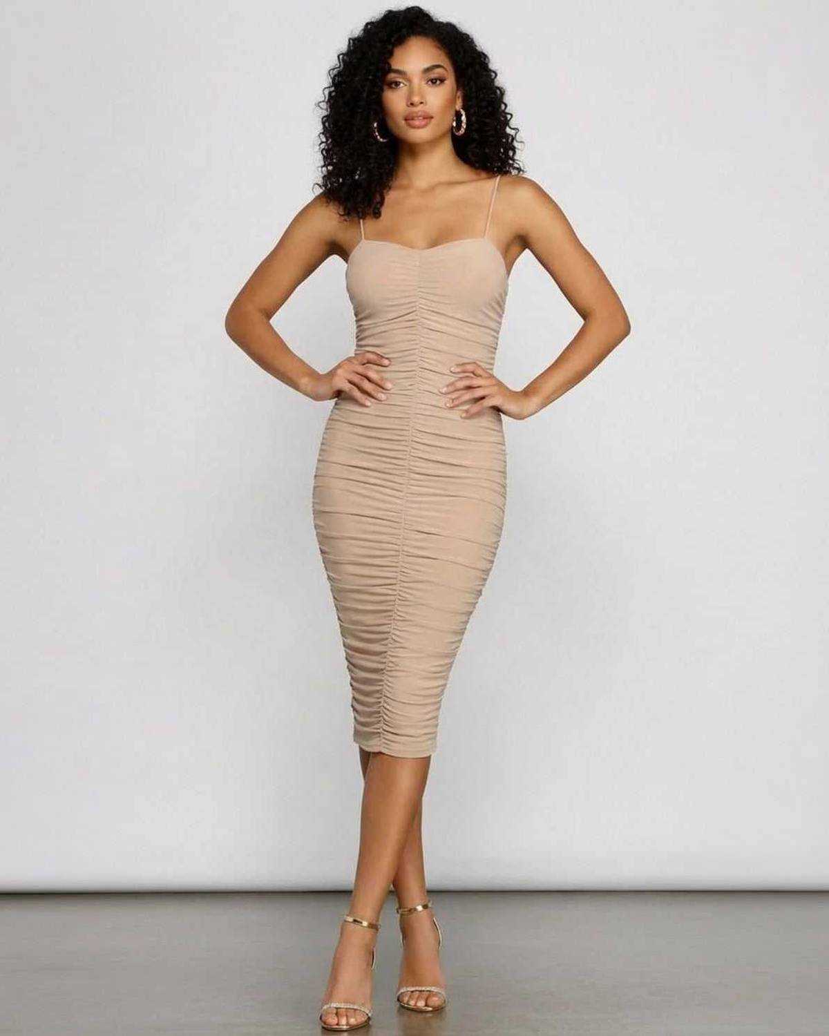 Solenne Midi Dress by Lauven featuring a sweetheart neckline and ruched bodycon silhouette, perfect for evening wear.