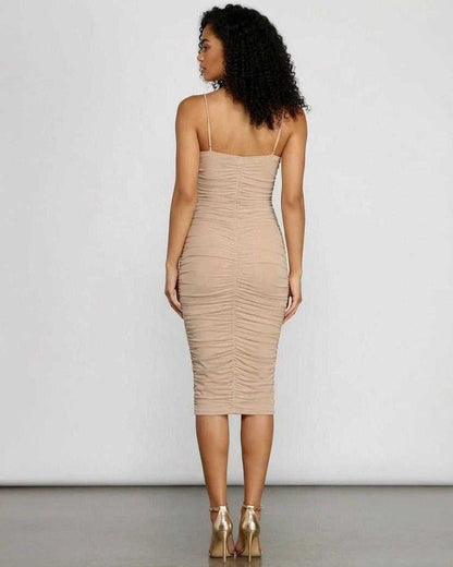 Back view of Solenne Midi Dress by Lauven showcasing ruched bodycon silhouette and sleek fit.