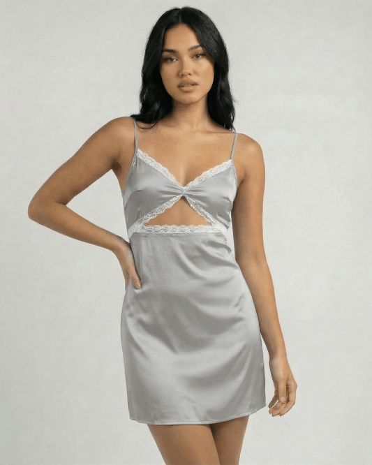 Sterling Mini Dress by Lauven, featuring lace trim and spaghetti straps in a smooth satin-like silver finish.